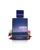 haramain amber oud dbai night perfume bottle surrounded with fragrance notes like saffron and amber shows against white background