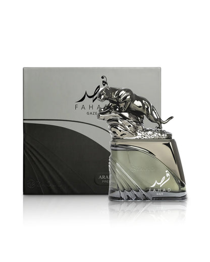 arabiyat prestige fahad gaze Perfume bottle with decorative cap featuring a logo and packaging on a white background