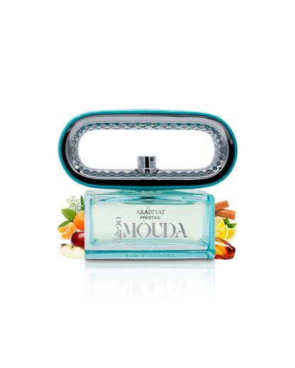 arabiyat restige mouda perfume bottle surrounded by fragrance notes like fruits and amber shows against white background