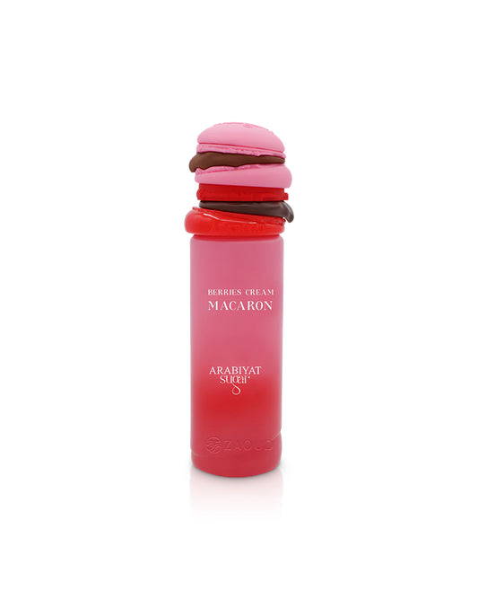 Pink macaron-shaped arabiyat sugar berries cream macaron perfume bottle shows against white background