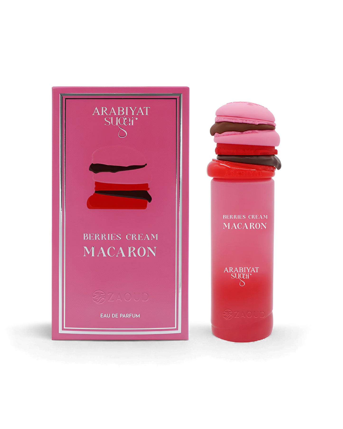 Pink macaron-shaped arabiyat sugar berries cream macaron perfume bottle shows beside its packaging against white background