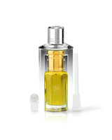 BALZAC perfume oil bottle shows amore caffe bottle shows behind against white background