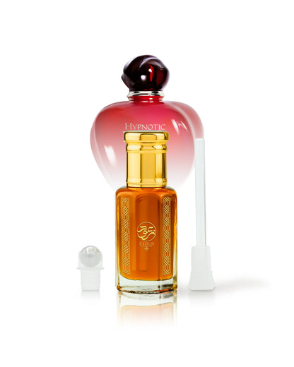 BITTERSWEET FAREWELL Dior Perfume oil bottle shows roller and stick and dior hypnotic poison bottle behind against white background