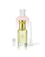 boujee fluf perfume oil bottle shows beside roller and stick with Yum Boujee Marshmallow kayali bottle behind against white background