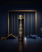 Badee Al Oud Amethyst air freshner bottle inside dark  blue surface room