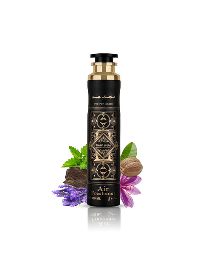 Badee Al Oud oud for glory air freshner bottle surrounded by nutmeg saffron against white background