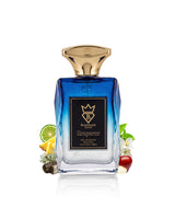 A faceted glass perfume bottle of bujairami emperor, a metallic gold cap, and a black front label reading 'Emperor' and 'Bourgeon London.' The bottle is centered on a white background with small decorative food and herb props around the base.