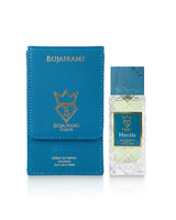 Bujairami Hectic Extractive Eau de Parfum bottle next to its blue textured leather box, featuring gold foil branding on a white background.