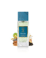 bujairami hectic extrait perfume bottle surrounded with fragrance notes like ginger and lemon shows against white background
