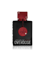 Armaf Club de Nuit Intense Overdose perfume bottle, featuring a matte black rectangular body with a metallic red cap and a hanging red circular medallion, set against a plain white background with a soft reflection.