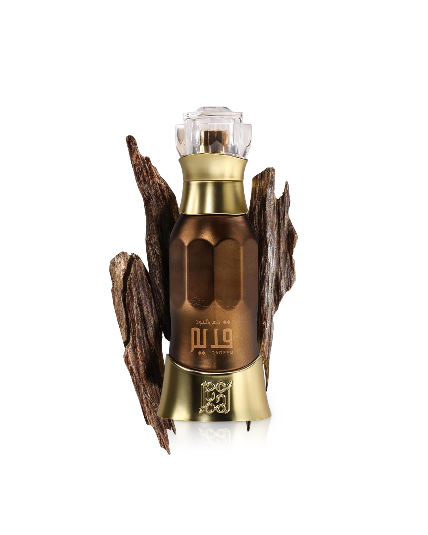 dehn al oud qadeem perfume bottle surrounded by oud chips shows against white background