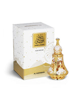 dunes of dubai perfume oil bottle shows beside its packaging against white background