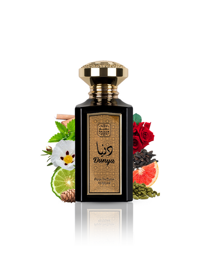 Dunya aqua parfum by naseem perfume bottle surrounded with its ingredients like cardamom and bergamot with many others shows from behind the bottle against white background