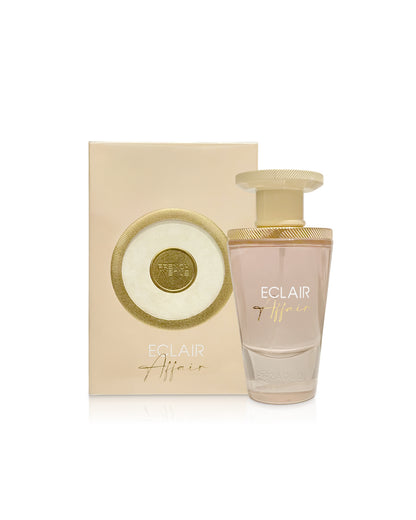 french avenue eclair affair perfume bottle shows beside its box against white background