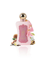 Fatima extrait de parfum perfume bottle surrounded by nutmeg vanilla against white background