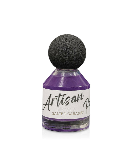 Bottle of Artisan Salted Caramel with a black CAPE top on a white background