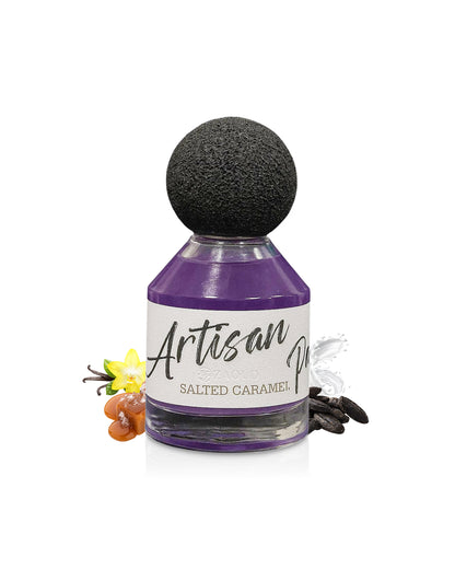 FRAGRANCE WORLD SALTED CARAMEL perfume bottle surrounded by caraela nd vanilla against white background
