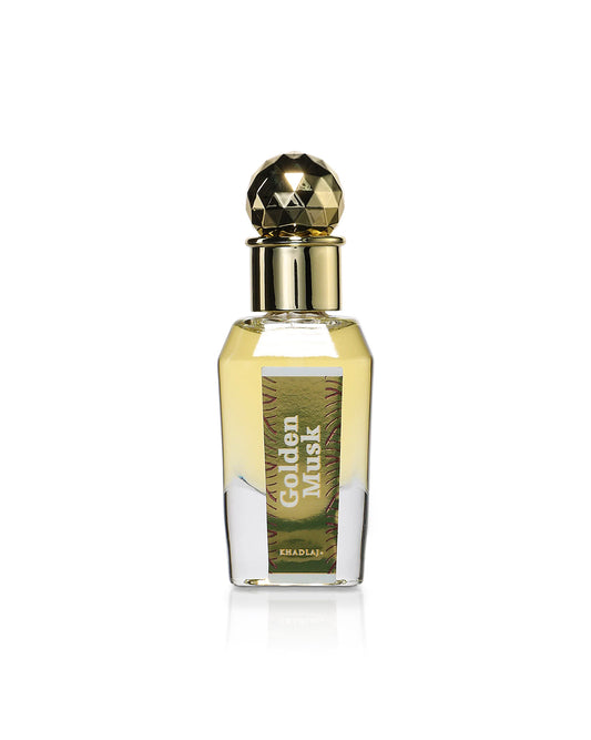 golden musk perfume oil bottle shows against white background