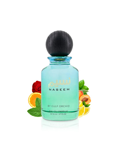 Naseem by Gulf Orchid perfume bottle with fruit illustrations on a white background