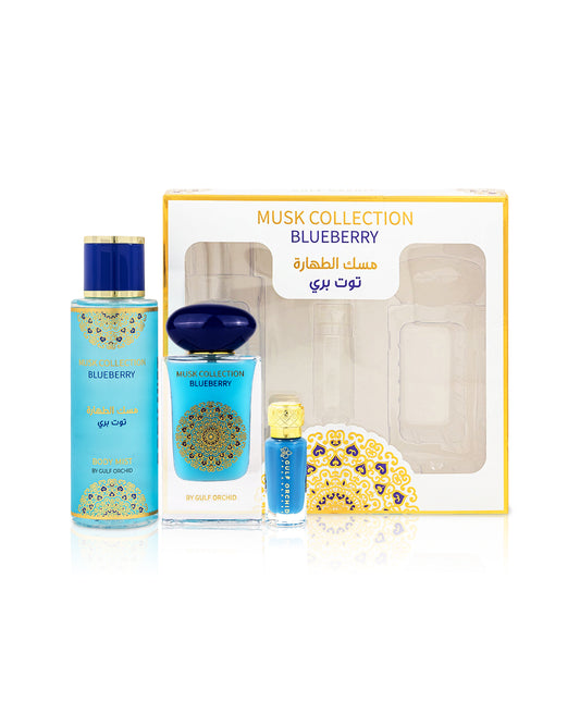 gulf orchid blueberry gift set box shows with perfume bottle beside oil and body mist bottle against white background