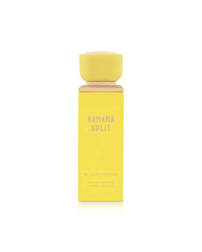 gulf orchid Yellow 'Banana Split' perfume bottle on a white background