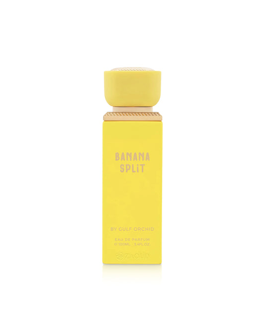gulf orchid Yellow 'Banana Split' perfume bottle on a white background
