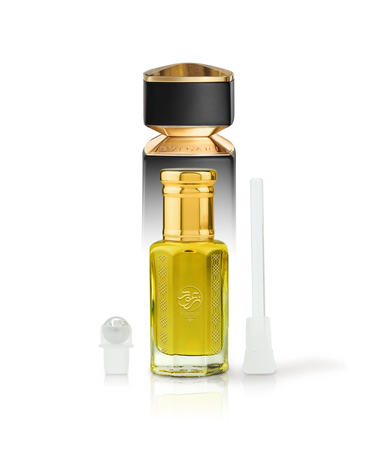 heliodor perfume oil bottle beside roller and stick with Bvlgari tygar behind shows against white background