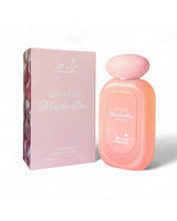 hekayat attar genzee marshmallow perfume bottle shows beside its box against white background
