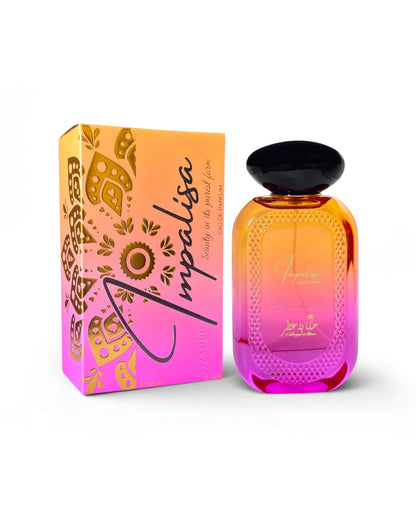 hekayat attar impalsia perfume bottle shows beside its packaging against white background