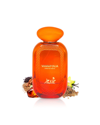 hekayat attar vannifolia perfume bottle surrounded by fragrance notes like amber and spices shows against white background