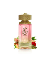 paris corner khair peach delulu Pink bottle with gold cap labeled 'KHAIR' on a white background with peach and rose decorations.