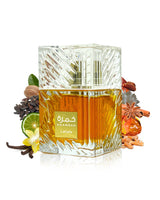 KHAMRAH EAU DE PARFUM perfume bottle surrounded by its ingredients like vanilla and amber against white background