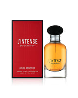MAISON ALHAMBRA L'INTENSE ROUGE ADDICTION PERFUME BOTTLE SHOWS BESIDE ITS BOX  AGAINST WHITE BACKGROUND