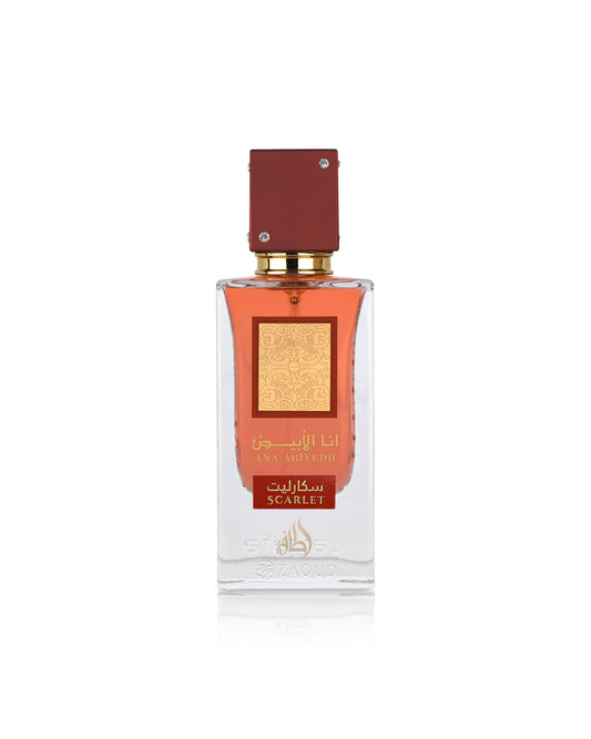 lattafa ana abiyedh scarlet Perfume bottle with red cap and gold accents on a white background