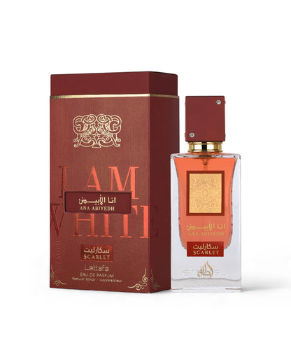 lattafa ana abiyedh scarlet Perfume bottle and packaging with gold and red design on a white background