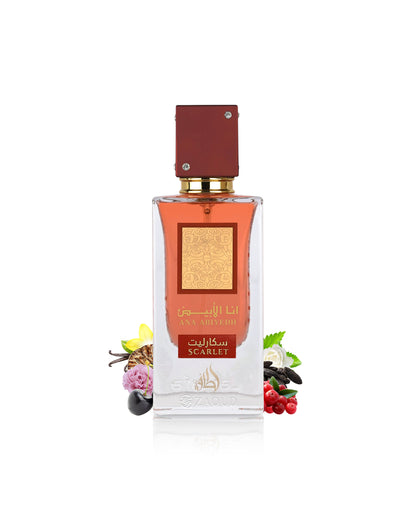 lattafa ana abiyedh scarletPerfume bottle surrounded by berries and vanilla with a red cap and gold label on a white background
