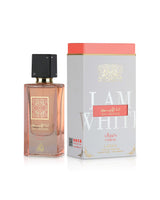 lattafa ana abiyedh coral perfume bottle shows beside its box against white background