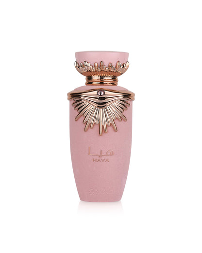 lattafa haya Pink perfume bottle with gold accents on a white background