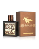 qaed al fursan untamed perfume bottle shows beside its box against white background