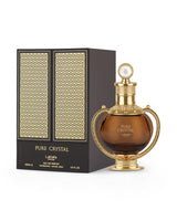 lattafa pure crystal perfume bottle shows beside its packaging against white background