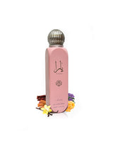 Lattafa Yara all over spray bottle surrounded by fragrance notes like vanilla and tangerine shows against white background