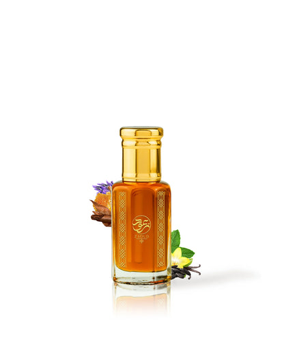 LE MALE ELIXIR  absoluture elixir perfume oil bottle Glass bottle with gold cap on a white background