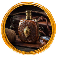 Leather Perfume bottle surrounded by leather goods