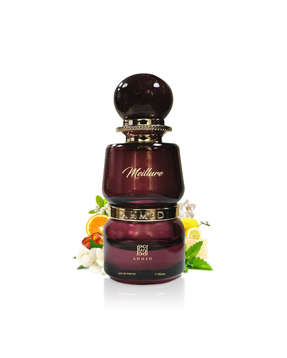 ahmed al maghribi meillure perfume bottle surrounded with fragrance notes like jasmine and honey shows against white background