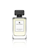 Swiss Arabian Mint and Wood perfume bottle on a white background