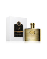 maison alhambra tonic malt perfume bottle shows beside its packaging against white background