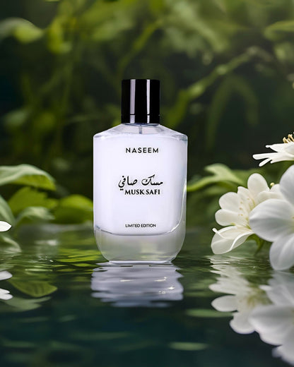 musk safi aqua parfum by naseem perfume bottle photograph over reflected fresh water besides some white wild flowers with green scenery at background 