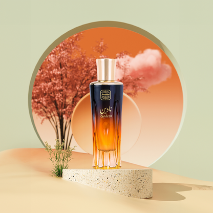 nadeen aqua parfum by naseem perfume bottle photograph over a round piece of ceramic with a oriental scenery like sunset