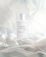 Not a perfume edp perfume bottle photograph against white fabrics