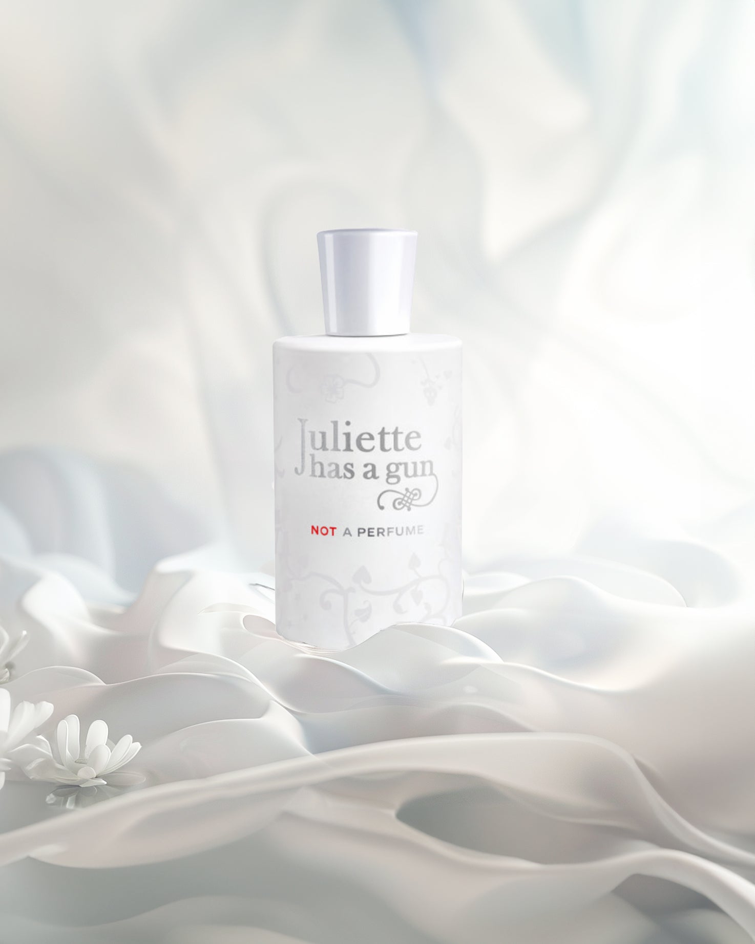 Not a perfume edp perfume bottle photograph against white fabrics